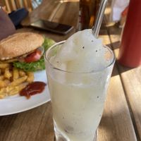 Pineapple smoothie that comes with burger   at Hostal Azul in Granada