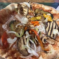 Vegetable pizza with vegan cheese  at Pizzeria Mezzaluna in Lanzarote