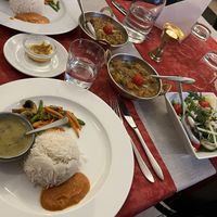 From left to right: Lentil soup, veg, tomato sauce. Bean stew, marinated aubergine stew. (Epic consistency on the aubergine; I loved it). Side salad.  at Himalaya Kök och Bar in Gothenburg