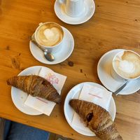 Brioche Vegana, one filled with strawberry and one with peach, and soy cappuccino  at Italian Bakery in Milan