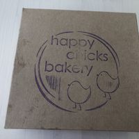 Carry-out container for pudla at Happy Chicks Bakery in Cincinnati