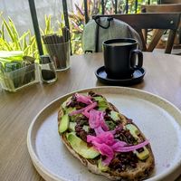 Avocado toast (without egg) and soy matcha 🥑 🍵 at Alfonsina Coffee in Tulum
