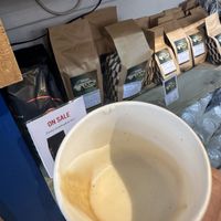 Very glamorous photo of an oat macchiato…… 😉  at Doppio Coffee Warehouse Kentish Town in North West London