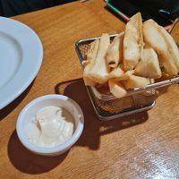 Yuca chips (with non-vegan dip) at Cantinho do Aziz in Lisbon