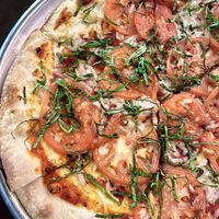 margarita pizza w vegan cheese & diablo sauce  at Poco Fiasco  in Dallas