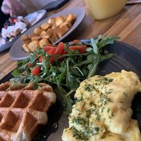 Amazing vegan breakfast, potatoes, pineapple juice   at Craffles in Vancouver