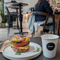 Sausage Egg and Cheese with a flat white at Beepublic in Brooklyn