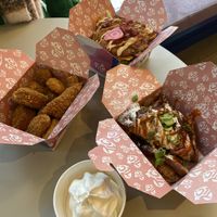 Boneless box to the left (they give soft ice with the waffles)!   at Taste Like Chicken TLC in Amsterdam