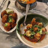 Soup, Cauliflower wings and dumplings  at Outra Espécie  in Porto