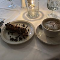 Vegan cannolo and cappuccino with coconut mylk. at John's of 12th Street in New York City