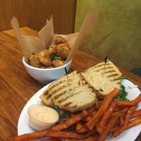 boys sweet potato fries and cauliflower  at Veggie Grill by Next Level in Long Beach