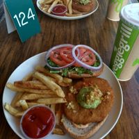 Burger with faux meat at Veggie Grill by Next Level in Long Beach