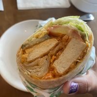 Digging In - Buffalo Chick’n’ Wrap - Half for Lunch/Half for Dinner 😛  at Veggie Grill by Next Level in Long Beach