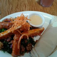 The All Hail Kale salad with Buffalo Chicken and Mini Mexi rolls. Very awesome at Veggie Grill by Next Level in Long Beach