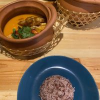 Tom yum soup served with rice  at Penne in Koh Samui