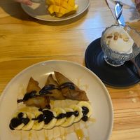 Banana rolls and coco-vanilla ice cream 
Mango sticky rice at the back at Penne in Koh Samui