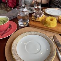 Macha latte with those yummy sweets   at A Padoca in Porto