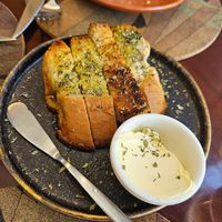Garlic bread with butter at A Padoca in Porto