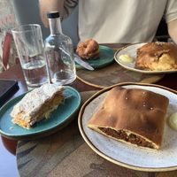 bola de berlim, delícia de ovos, lanche de espinafres e ricotta e lanche de big mac   at A Padoca in Porto