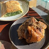 Spinach and ricotta roll; chocolate hazelnut croissant - both fantastic!   at A Padoca in Porto