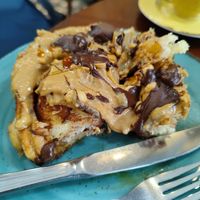 Cinnamon bun with peanut cream and chocolate at A Padoca in Porto
