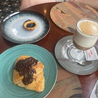 Chocolate croissant, pastel de nata and Vietnamese Coffee at A Padoca in Porto