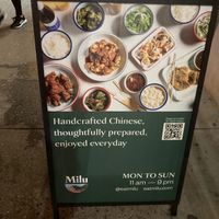 Placard in front at Milu in New York City