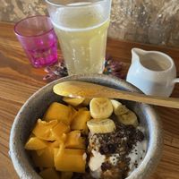 Granola in the bowl, kombucha in the glass   at Limau Limau Cafe in Malacca