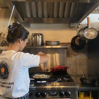 Chef doing her thing  at Limau Limau Cafe in Malacca