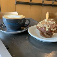 Oat latte and banana ginger muffin  at Herkimer Coffee in Seattle