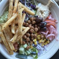 Vegan wrap, but in a bowl, add fries. I loved the sauce and crispy chickpeas especially!  at Spitz in Frisco