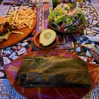 Tamal veggie acompañado de ensalada at Sativa Studio Cafe in Banos