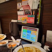 Lots of empty plates! And the ordering tablet and menus at CoCo Ichibanya in Kyoto