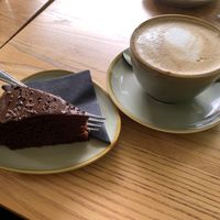 Vegan chocolate cake and oat milk latte   at The Coffee Press in Kilmarnock