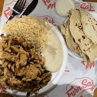 chicken plate with rice and hummus as side   at Furnsaj in San Diego
