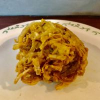 Onion bhaji  at This & That Cafe in Manchester