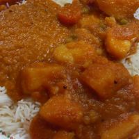 Vegan curries and rice at This & That Cafe in Manchester