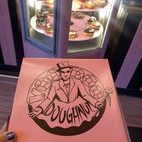 Famous Pink Box and Doughnut Display Case in Back  at Voodoo Doughnut in Portland