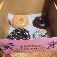 Some favorite selections! Classic glazed, Oreo, chocolate cake and cake with sprinkles 🍩  at Voodoo Doughnut in Portland