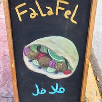 Sign  at Monkey Monkey Falafel in Bacalar