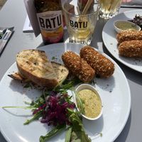 Vegan mushroom kroketten with passionfruit kombucha   at MIMIK Film Theater Café in Deventer