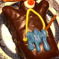 Pictured here is a vegan Voodoo Doll Doughnut  at Voodoo Doughnut Too in Portland