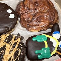 A box of VooDoo Donuts  at Voodoo Doughnut Too in Portland