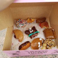 We got the box of a dozen vegan doughnuts and only remembered to take a picture after devouring most of them. at Voodoo Doughnut Tres in Eugene
