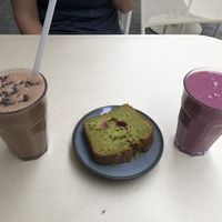 Two smoothies and the matcha cherry cake  at roots - Münstergasse in Zurich