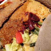 The veggie combo is more aesthetically pleasing when dining in, but just as "delish" when having take out! at Delish Ethiopian Cuisine in Seattle
