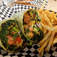 Veggie packed crispy chicken wrap. at rooted AF in Wilmington