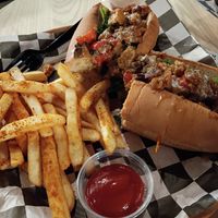 Pinky Cole with "chicken" at rooted AF in Wilmington