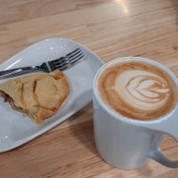 Chocolate rose latte with oatmilk and a vegan "chickn pot pie" hand pie. at New Love Coffee in Liberty Lake