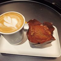 White latte and muffin at IzyCoffee  in Leuven